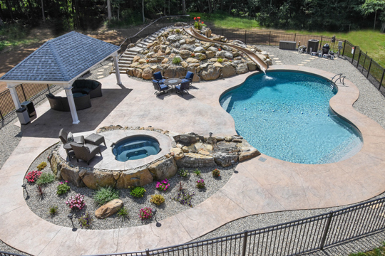 This is a photo of a mountain pond style inground swimming pool.